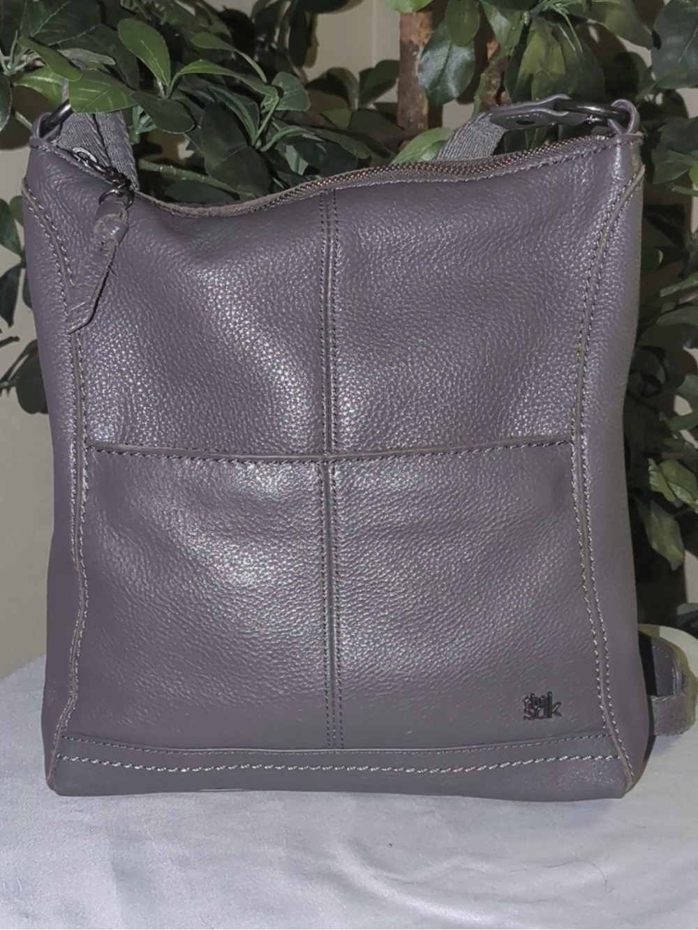 The Sak Pebbled Leather Crossbody Bag in Taupe Gray